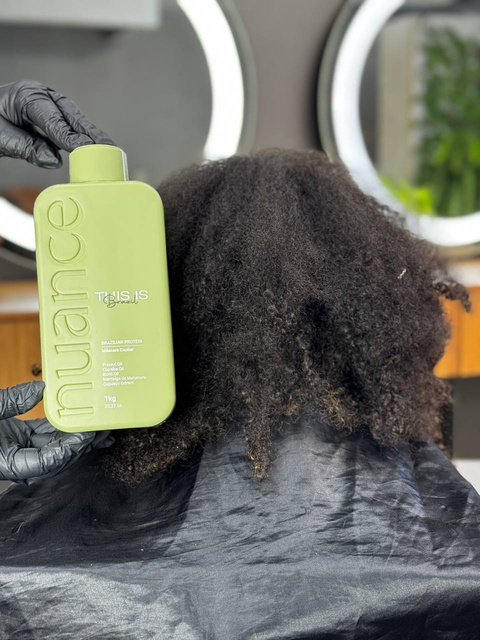 Afro-textured hair before This is Brazil treatment